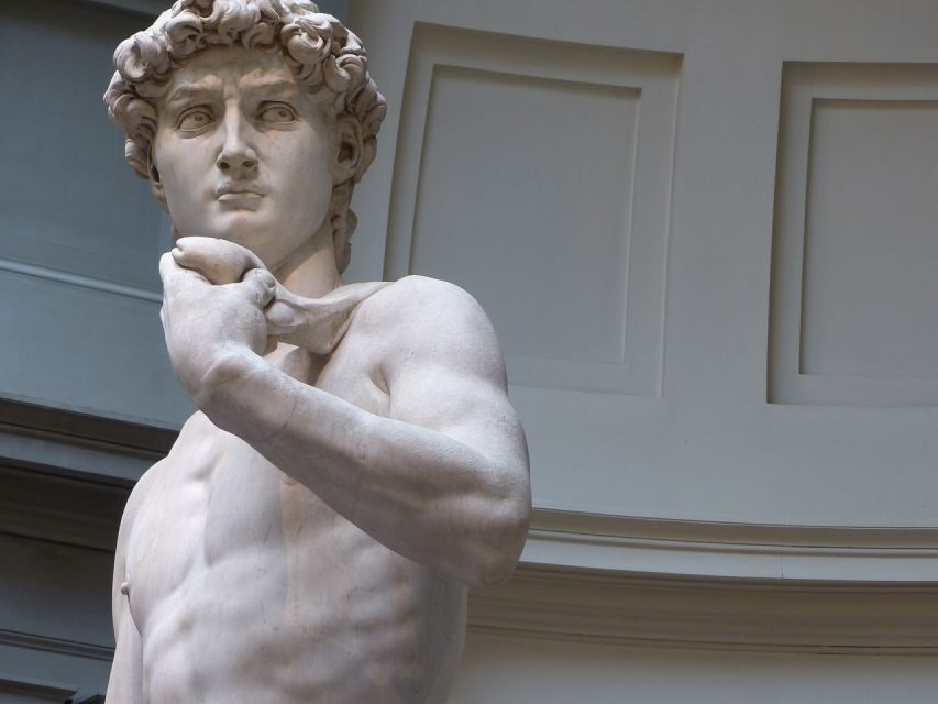 Florence: Accademia Guided Tour with Skip-the-Line Tickets - Old glass windows and medieval craft details