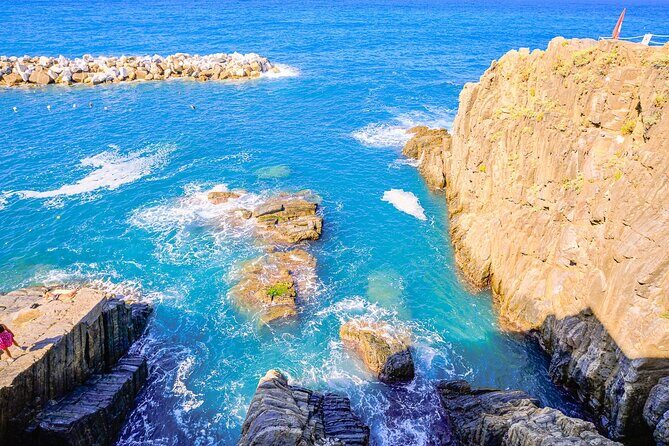 Florence: Cinque Terre Park Day Trip with Optional Street Food - Riomaggiore: Final Village Energy and the Sunset Tempo