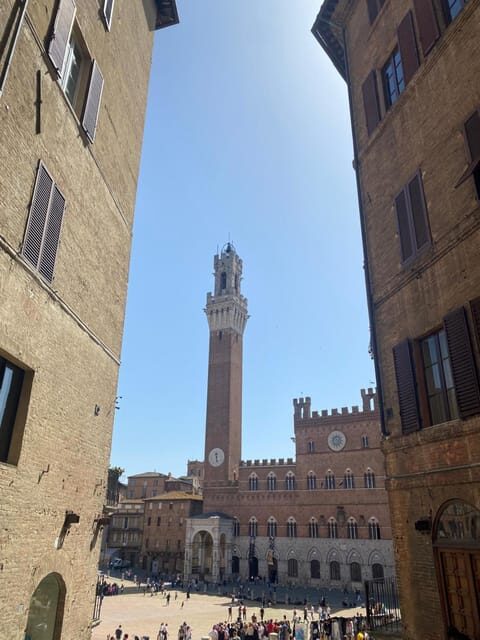 Florence: Day Trip with Free Time in San Gimignano and Siena - Coach comfort, Wi‑Fi, and GPS audio during the 9-hour loop