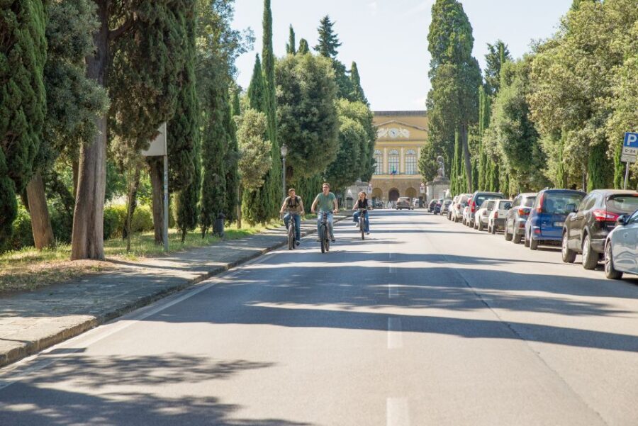 Florence: Guided Electric Bike Tour with Gelato - Rolling back down toward Florence: Lungarno riverside streets