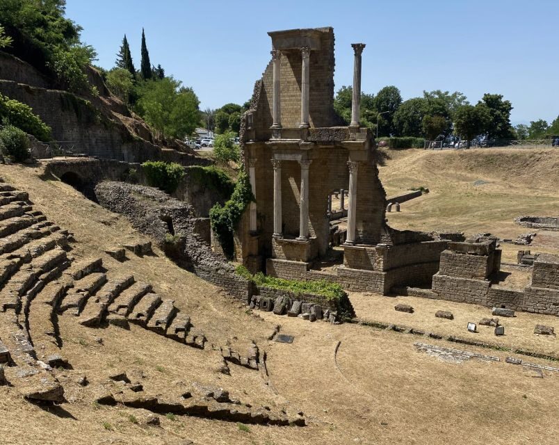 Florence: San Gimignano & Volterra Day Trip with Food & Wine - San Gimignano towers and gelato: guided history that helps you look longer