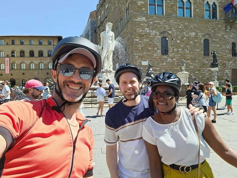 Florence: Untold Bike tour with Roberto - Florence’s “wine windows” pause and a sip of local legend
