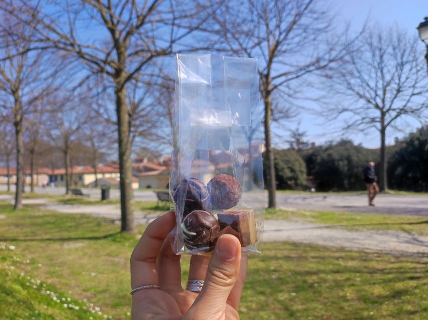Lucca: Guided Food Walking Tour with Tastings - The sweet finish: chocolates, ice cream, and buccellato in its classic shape