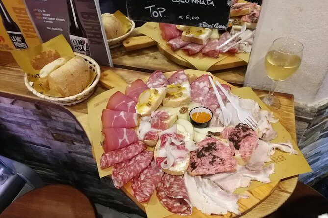 Pisa’s Ultimate Food Tour: Full Tuscan Meal by Do Eat Better - Stop 1 on Lungarno: cured meats and red wine with real river views