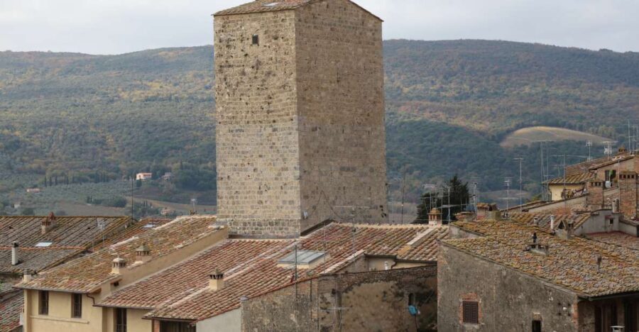 San Gimignano Campatelli Home and Tower Visit - The Intro That Sets the Mood: The Wall-Projected History Video