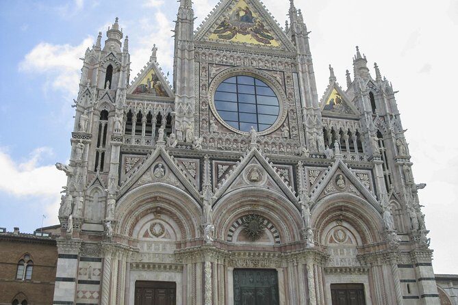 Skip the Line: Siena Duomo and City Walking Tour - Contrade on foot: Piazza Salimbeni and Siena’s identity