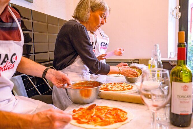 The Italian Way: Pizza and Gelato Class with Unlimited Wine - Baking in the pizza oven: toppings, heat, and the moment of truth